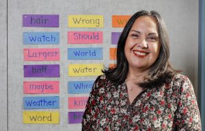 Portrait of Gabriela Galvez in a classroom at El Cajon Adult School.