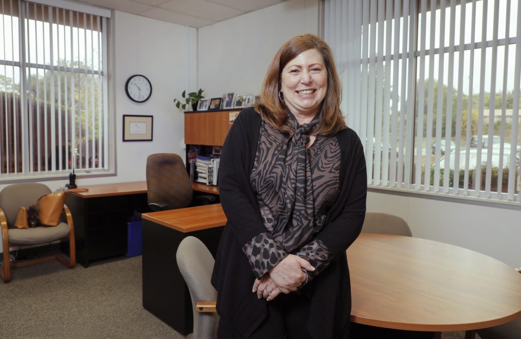 Portrait of Kathleen Porter in her office. She is the Executive Director of Career Technical, Adult, and Alternative Education in the Poway Unified School District.