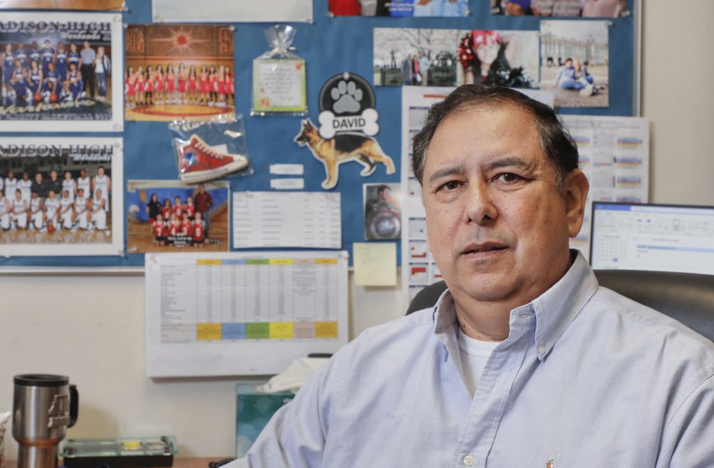 Portrait of David Guzman, Assistant Director of Poway Adult School, in his office.