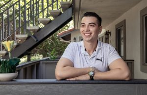 Portrait of Vista Adult School student Brayan Smith Enriquez Diaz on his apartment patio.