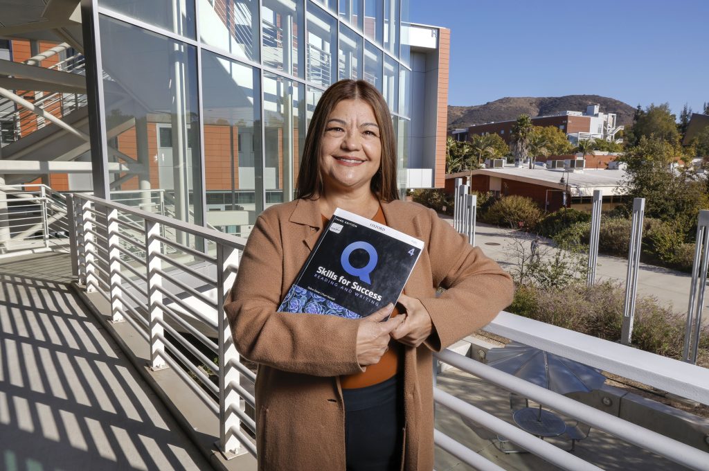 Student Maria Venegas walks through the campus at Palomar College_Photo by Charlie Neuman