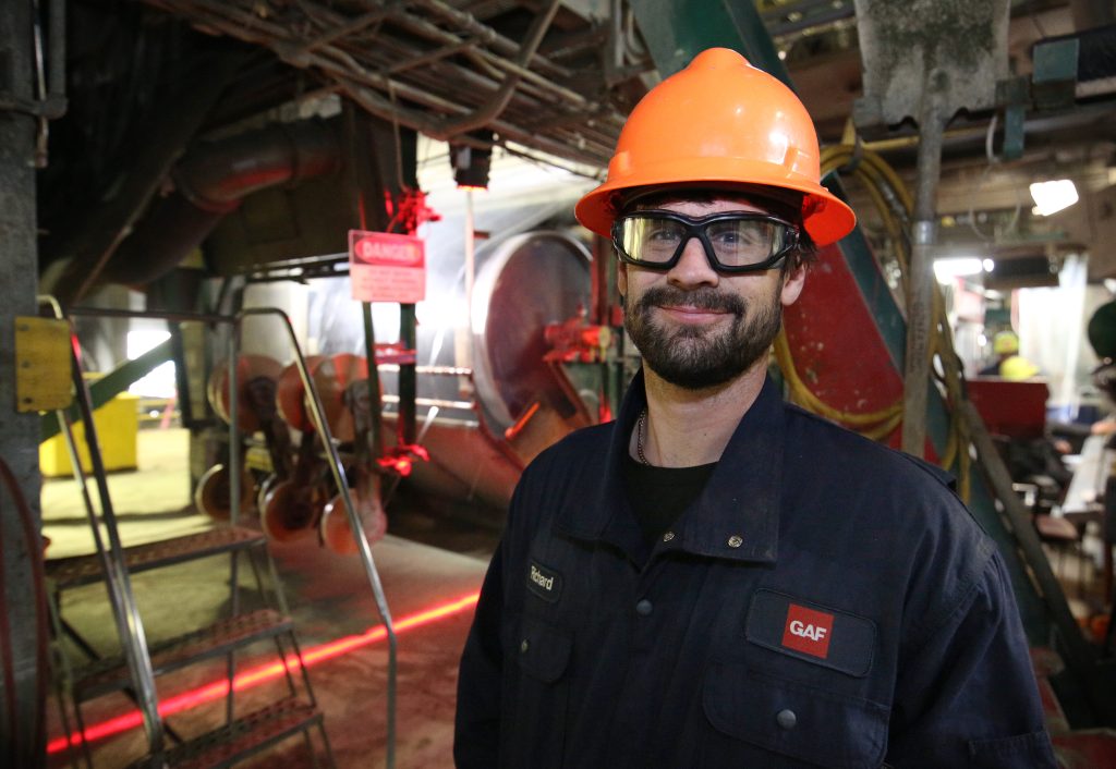 Richard Van Horne shown on the job as an Electrical Instrumentation Supervisor at the GAF shingle manufacturing plant