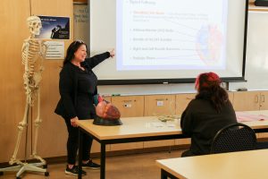 Vania Edgerly teaching in a classroom