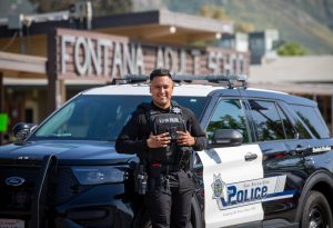 Portrait of San Bernardino Police Officer Bryan Lymus, outside Fontana Adult School on April 23, 2025. Lymus is a former student of the school.