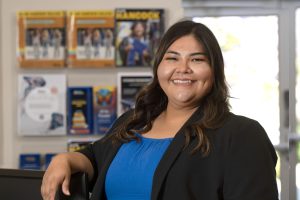 Alicia U. Paniagua, Dean of Community Education, Allan Hancock College’s Adult Education Program, poses for a picture in the her office lobby.