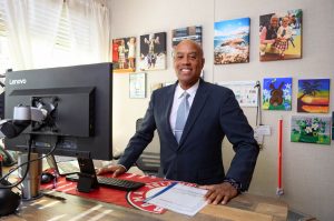 Schel Brown, Academic Dean, Lompoc Adult School and Career Center, works in his office