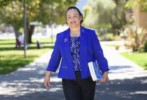 Allan Hancock College paralegal student Damaris walks on the Santa Maria campus.