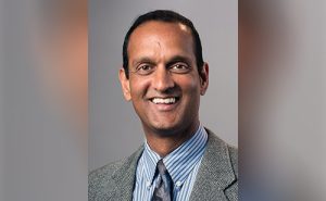 A professional headshot of Pradeep Ramanathan